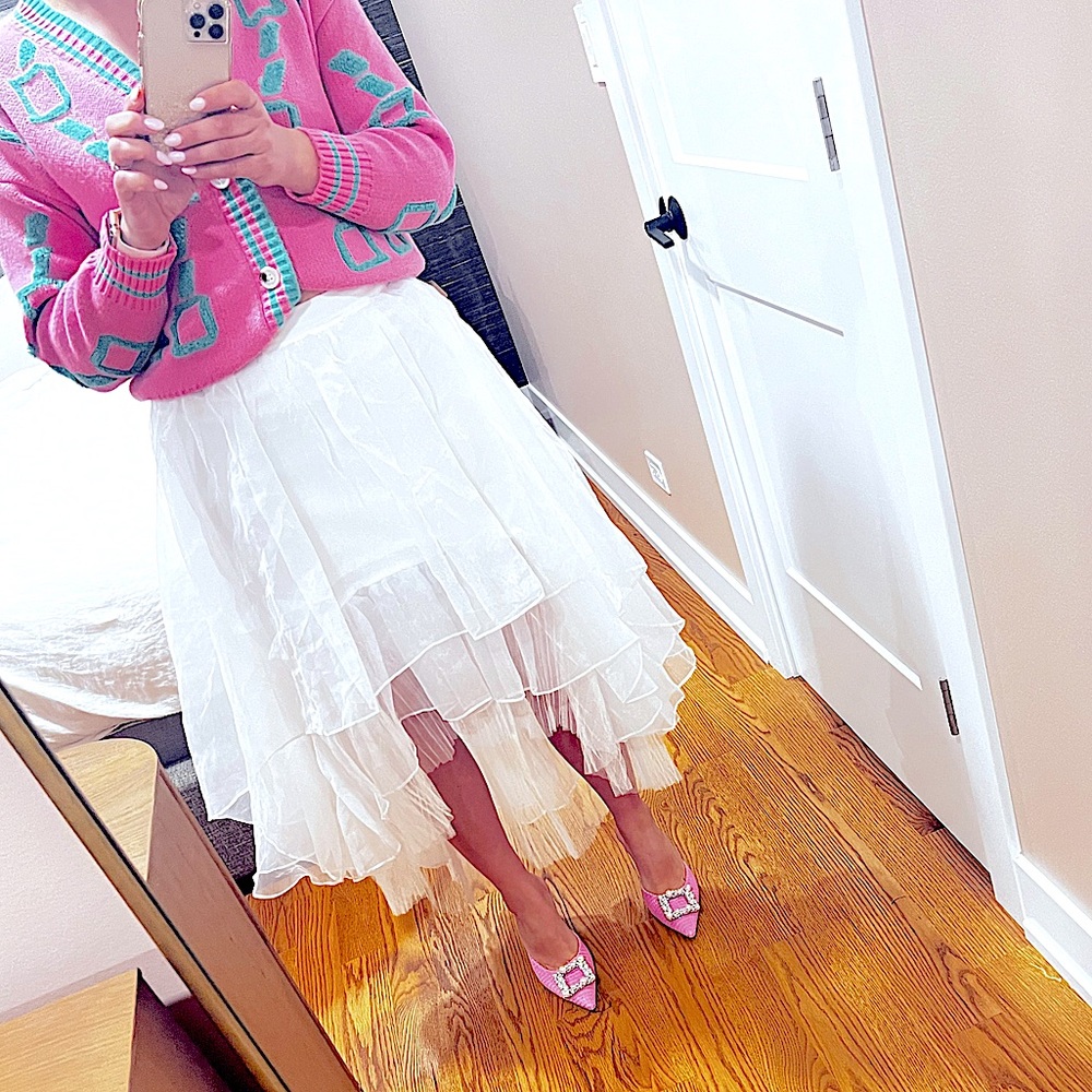 Beautiful White asymmetrical skirt by Jump Apparel. Size M